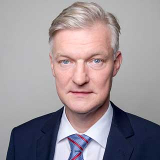 Portrait von BVMW-Chefvolkswirt Hans-Jürgen Völz