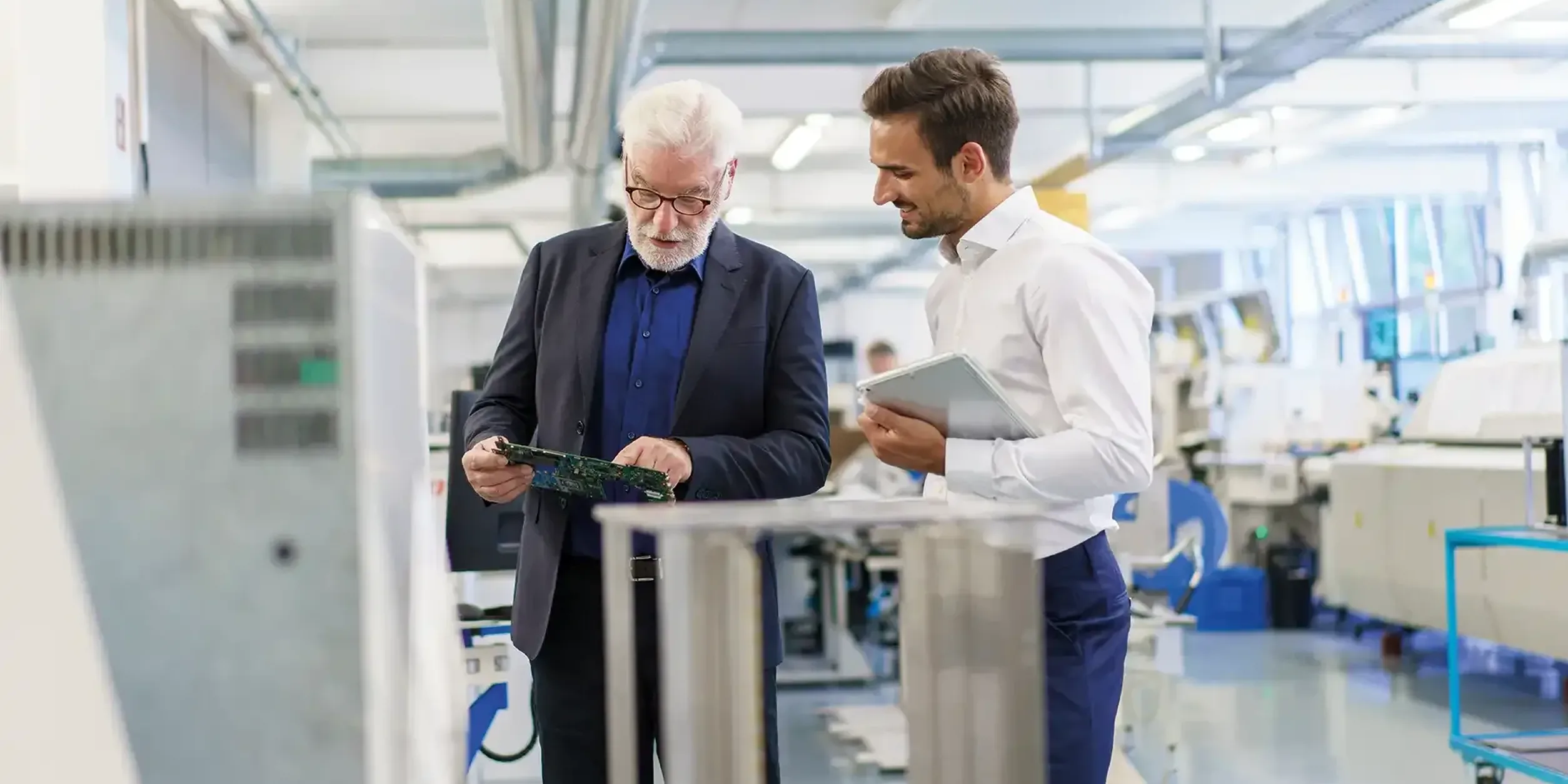 Alter und junger Mitarbeiter - Nachfolge