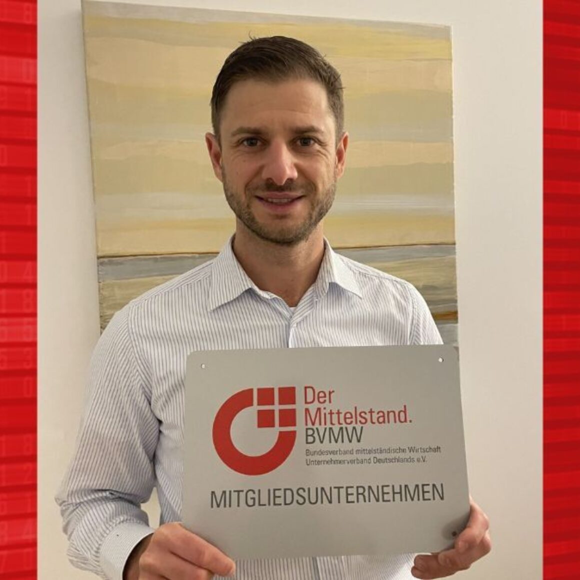 Dr. Ferstl mit BVMW Mitgliedsplakette