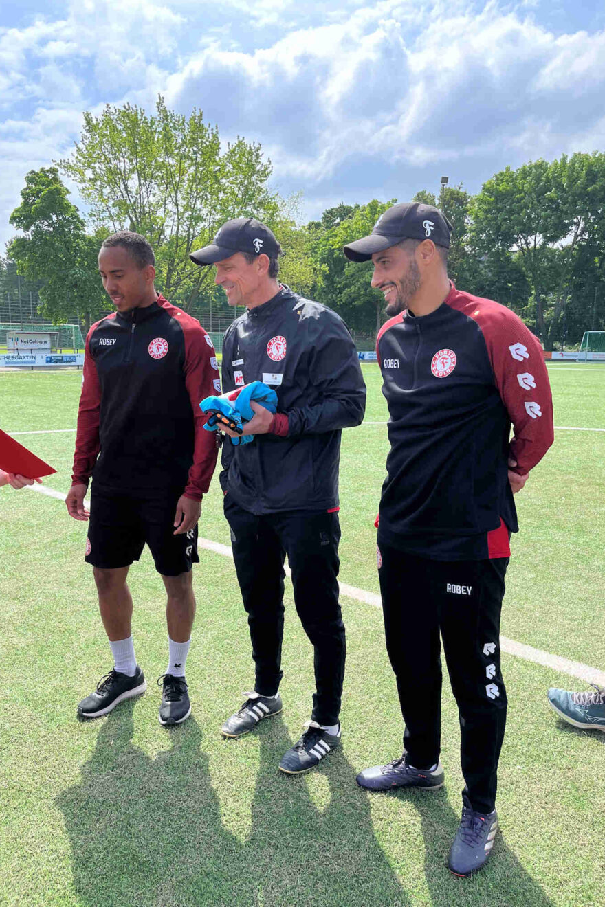 Drei Spieler/Trainer