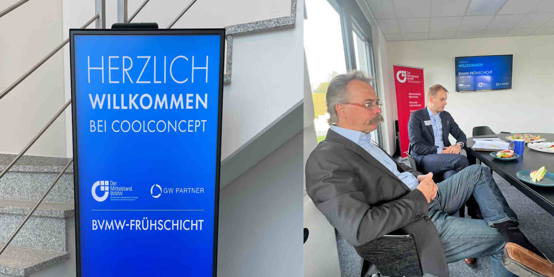 Begrüßungstafel und Teilnehmer