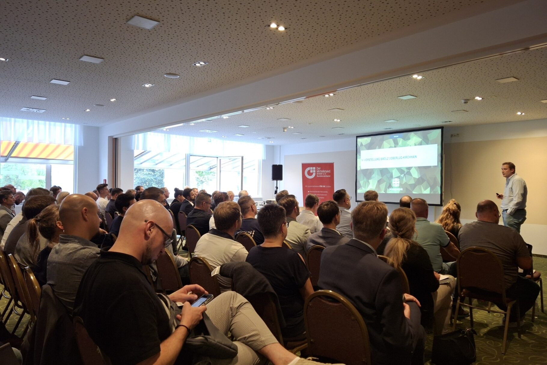 Teilnehmer der Veranstaltung während der Präsentation von Herrn Matschke.