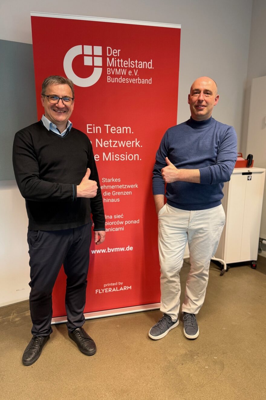 Teilnehmer der Veranstaltung Vibe Coding Mariusz Rzeznikiewicz und Referent