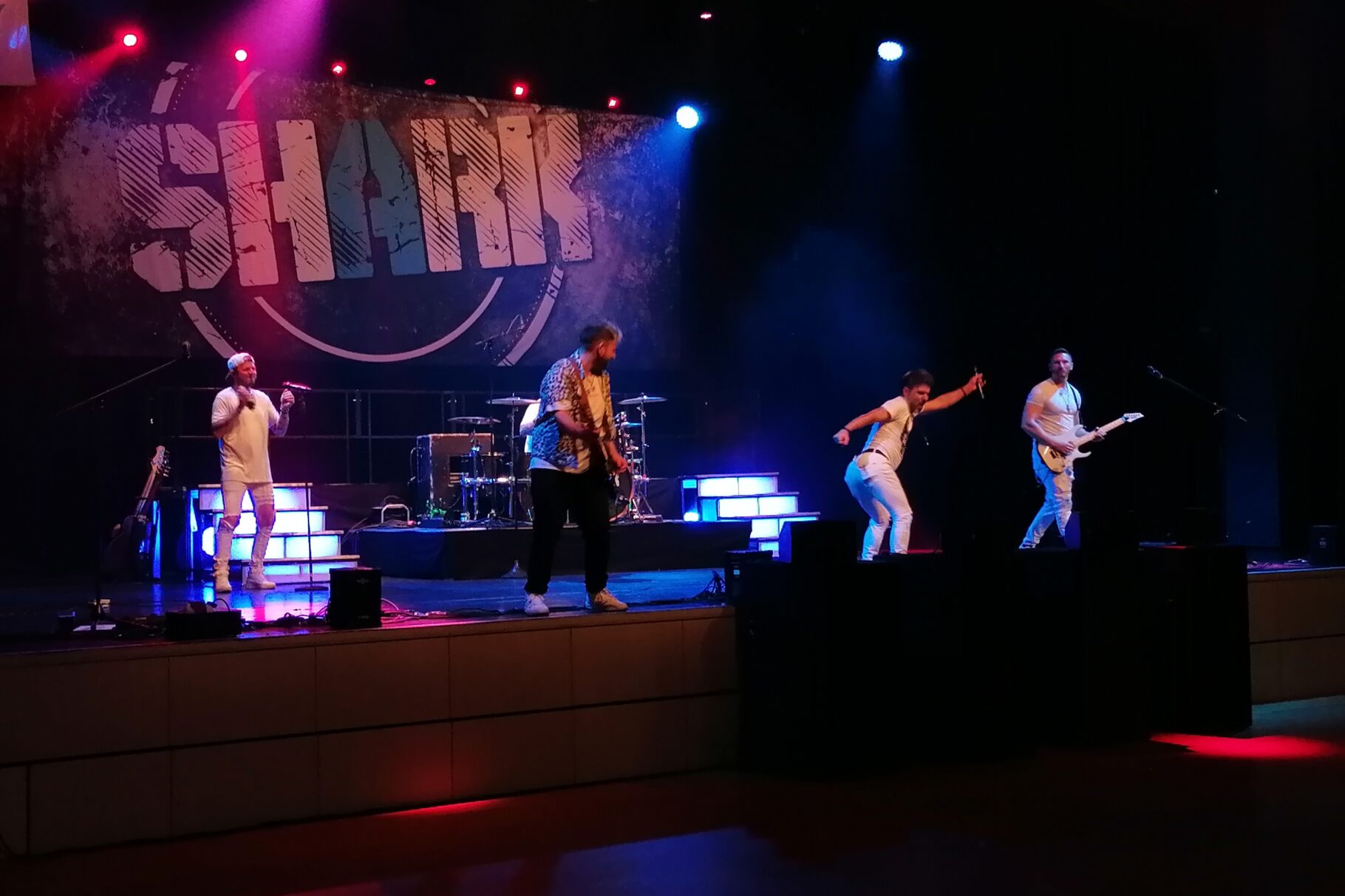 Blick der Teilnehmer auf die Bühne zur Band