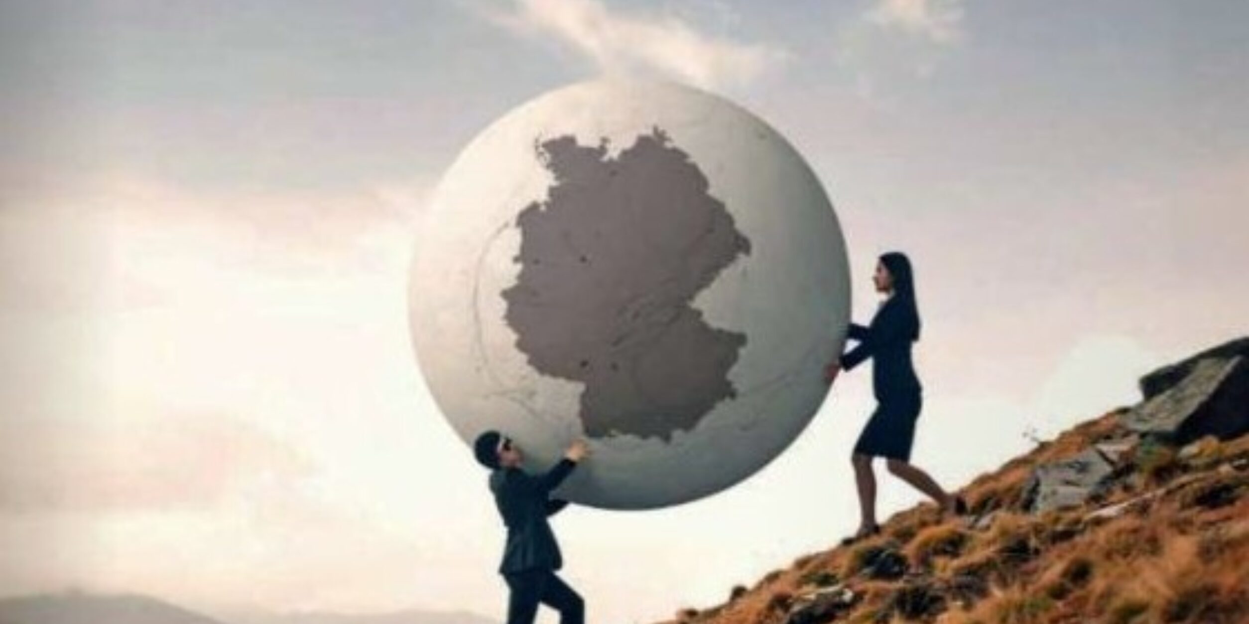 Cover der ausgabe des Econo mit den Spezialteil des BVMW (zwei Menschen tragen eine riesige Kugel den Berg hoch. Auf der Kugel zu sehen)