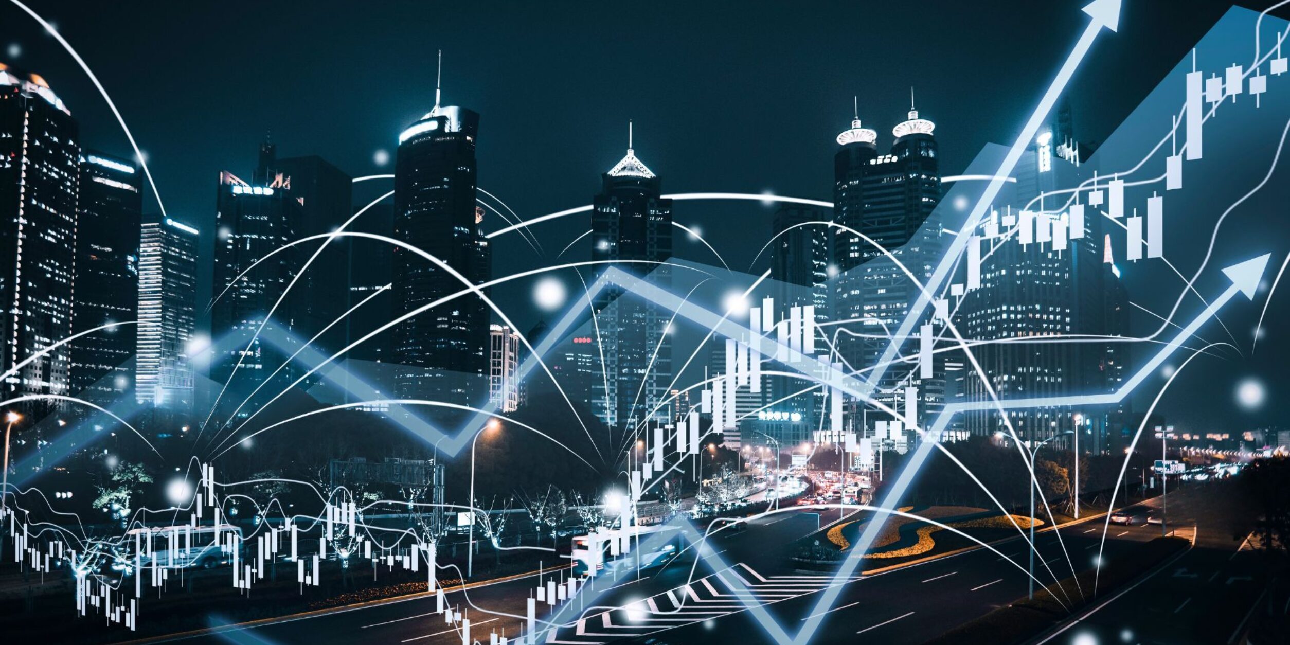 Aktienverläufe über eine Skyline gelegt